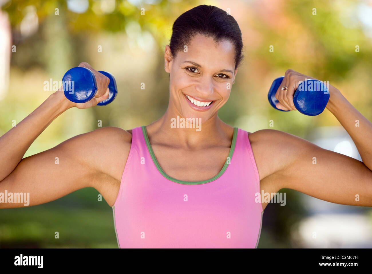 Pretty African American woman working out Stock Photo
