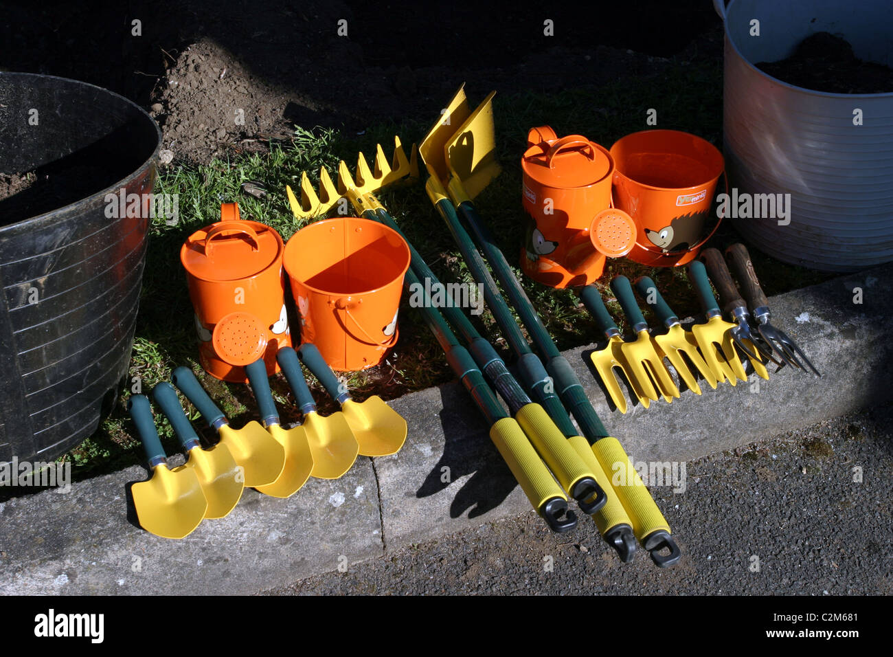 Kids Gardening Tools in a School Allotment Stock Photo