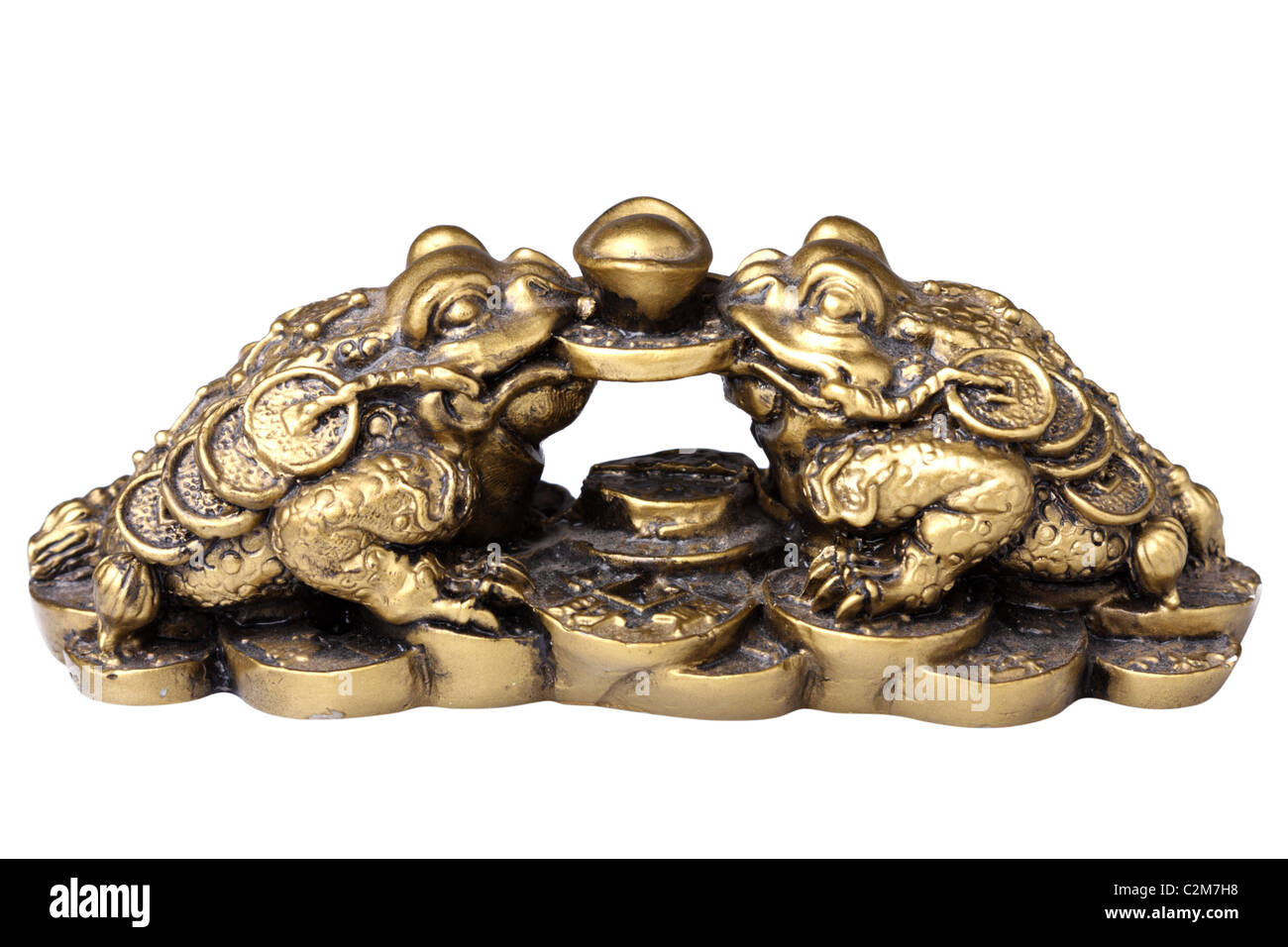 Two chinese feng shui frogs with coins. Isolated on white background Stock Photo