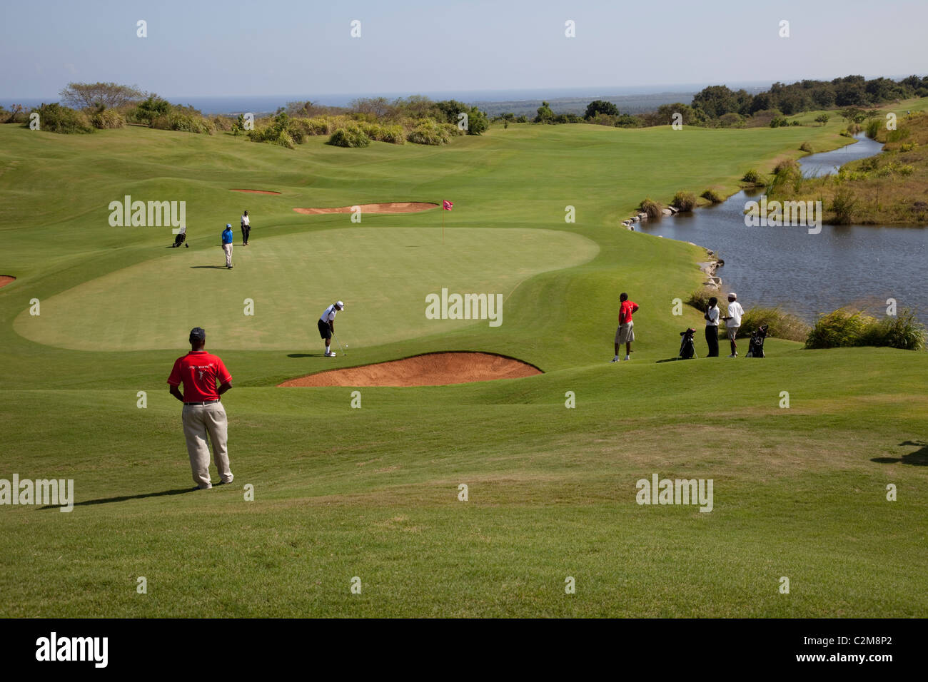 Golfers on green Virgin Atlantic Golf Tournament International Golf Course Vipingo  Ridge Mombasa Kenya Stock Photo - Alamy