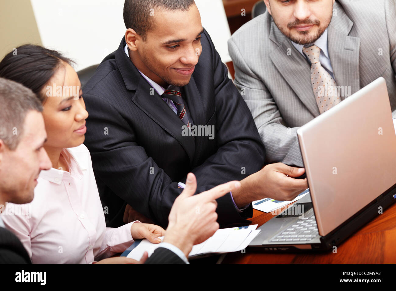 Multi ethnic business team at a meeting Stock Photo