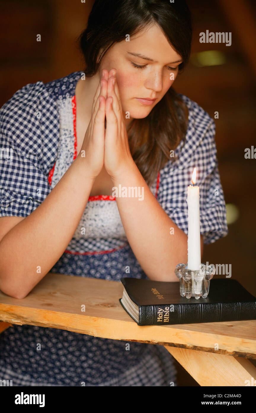 Woman Prays Stock Photo