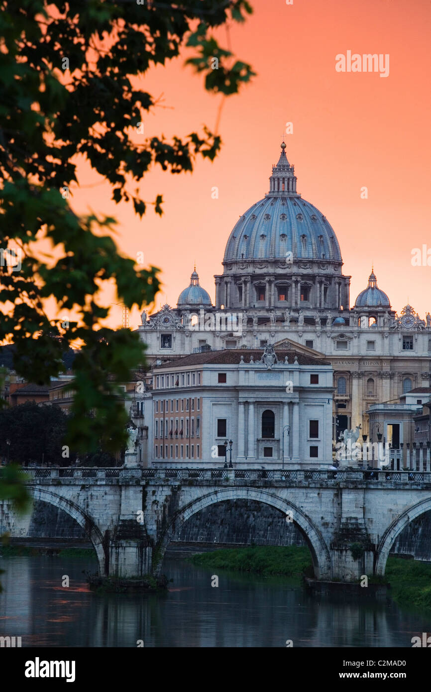 Ponte Sant'Angelo and St. Peter's Basilica at sunset, Vatican City, Rome. Stock Photo