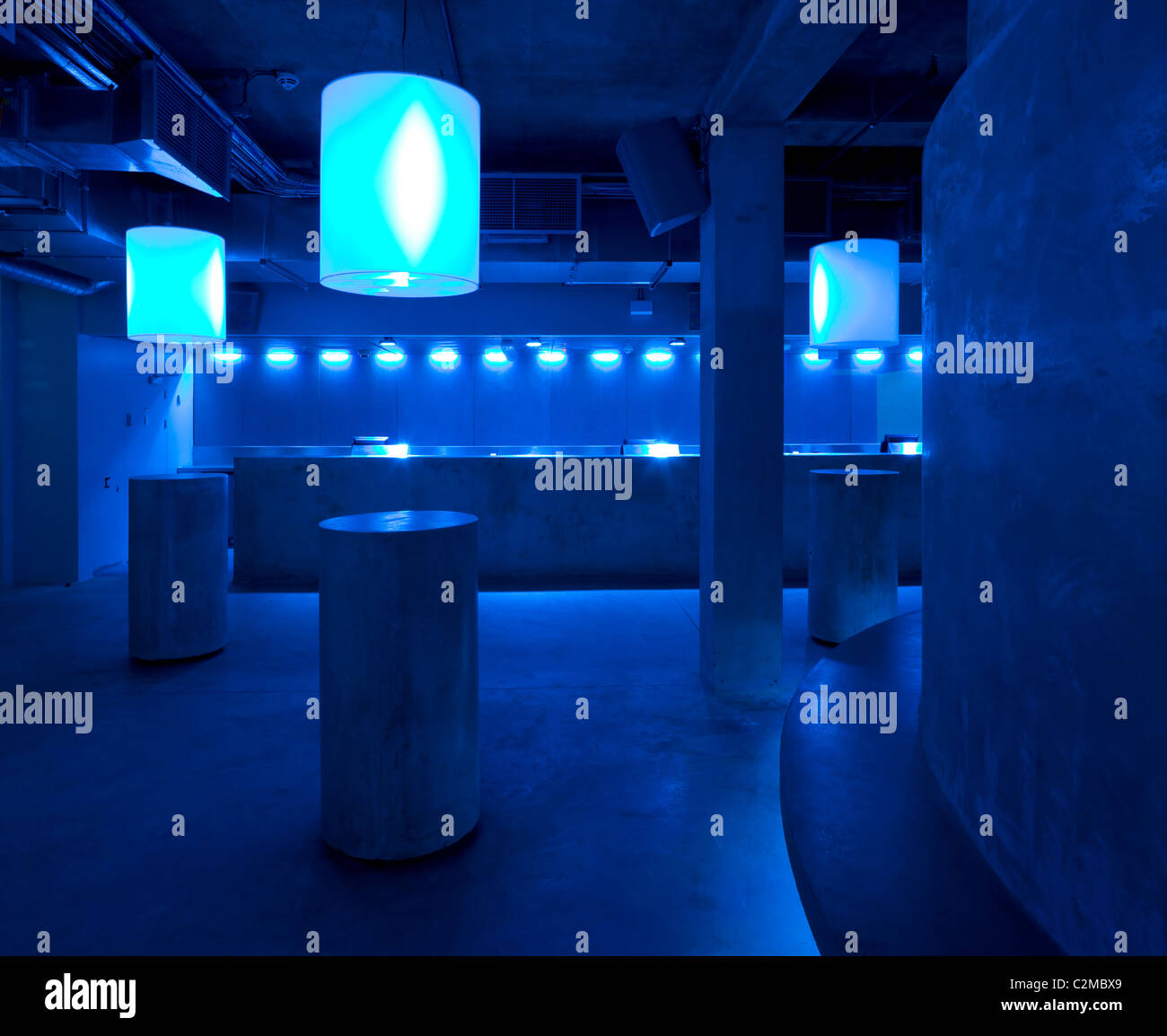 Matter, The O2 Arena, Peninsula Square, London. drum tables of concrete