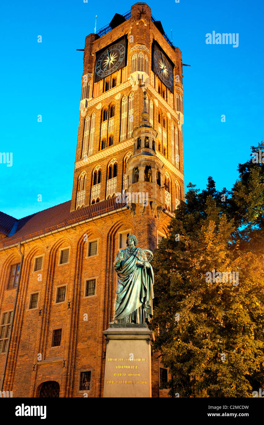 Toruń City Hall Tower and Statue of Nicolaus Copernicus Stock Photo