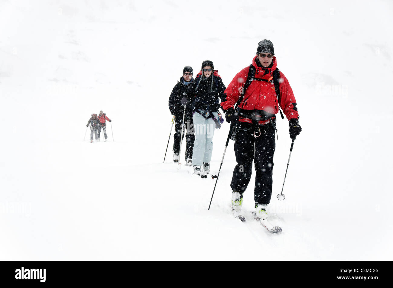 Ski touring on the lower Brenay glacier on the Haute Route, Switzerland. Stock Photo