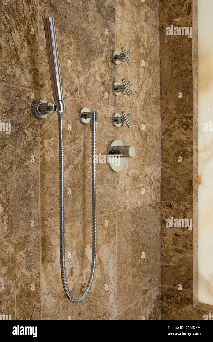 Hand shower holder hi-res stock photography and images - Alamy