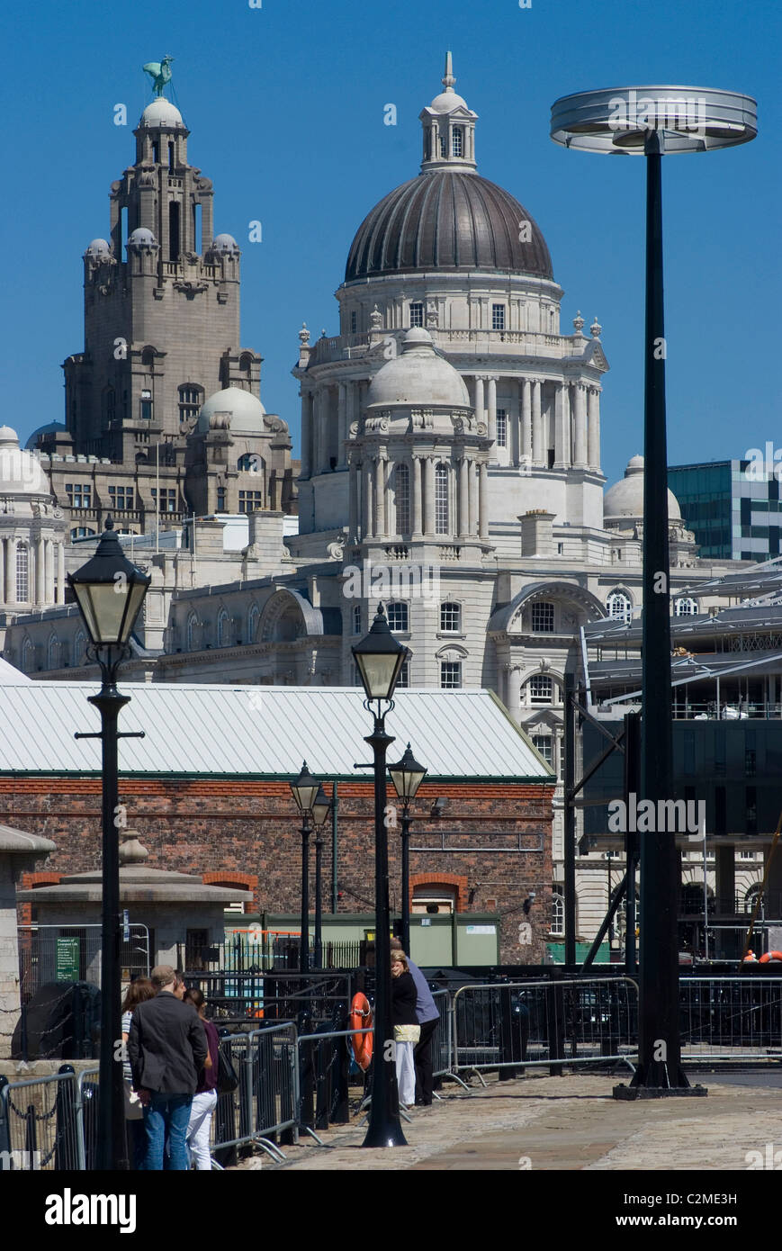 View from Albert Docks towards the Three Graces (the Liver, Cunard and Port of Liverpool Buildings), Liverpool, Merseyside, Stock Photo