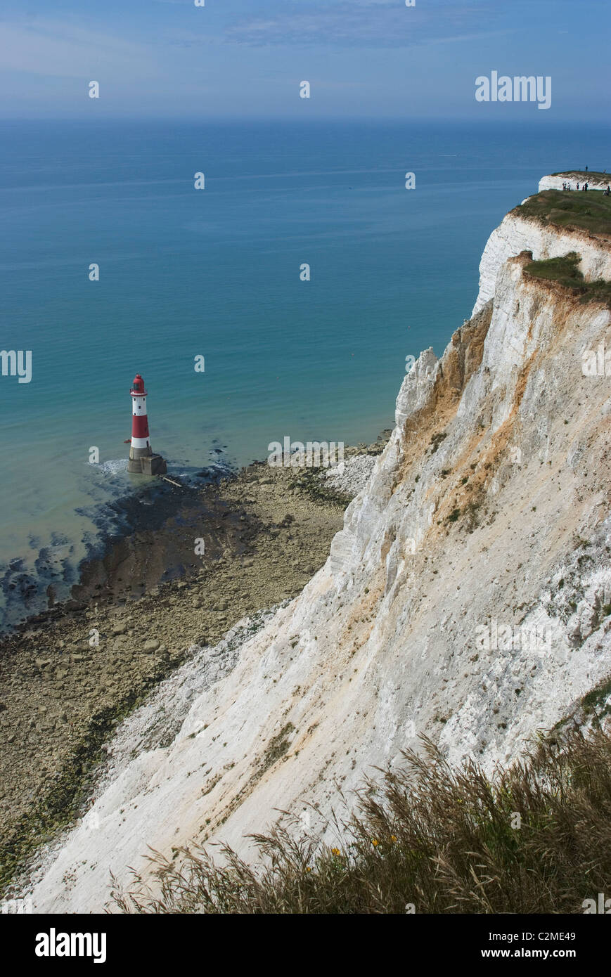 View of the lighthouse at the base of the White (chalk) Cliffs, Beachy Head, East Sussex, England Stock Photo