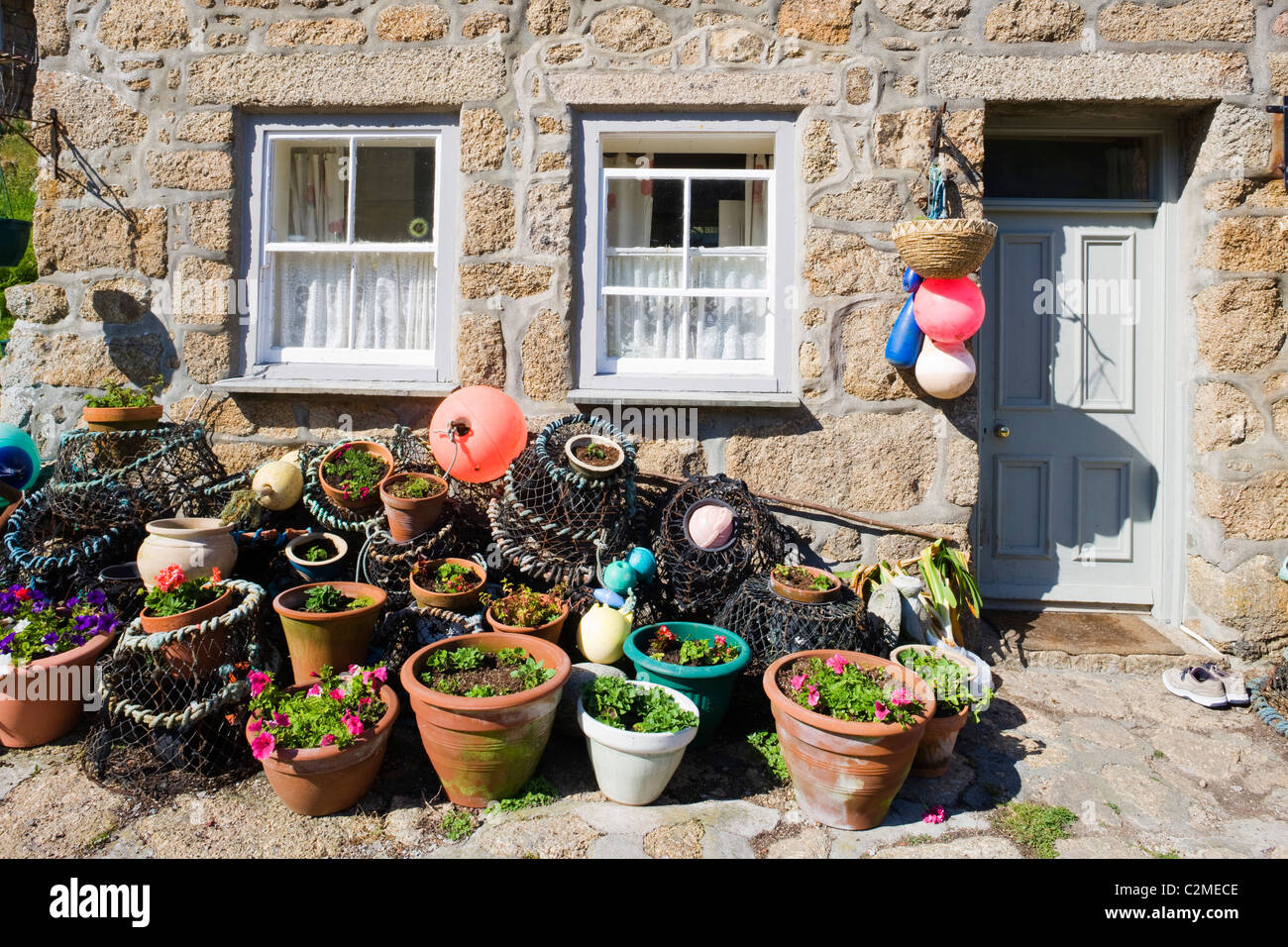 Crab pots outside a beautiful and traditional fishing cottage at