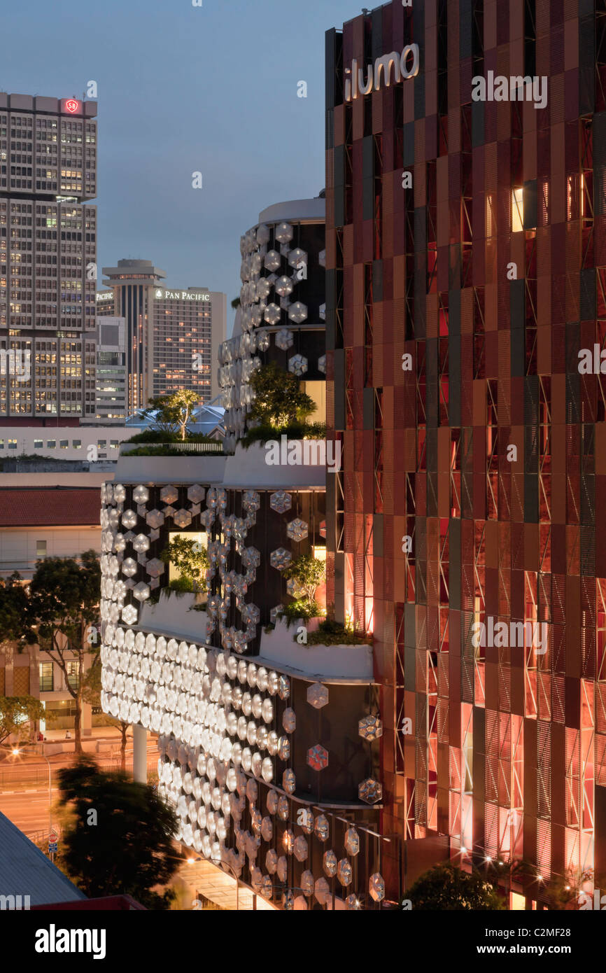 Exterior of iluma shopping and cinema complex in Singapore by WOHA Facade lighting by realities