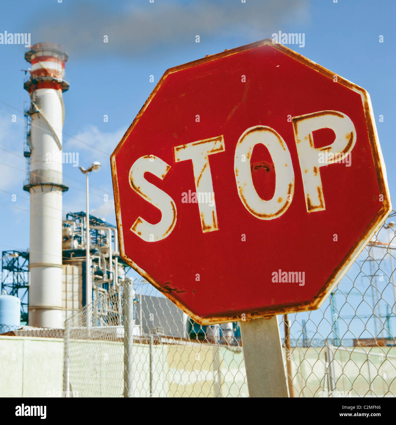 Stop Sign Near Industrial Buildings, Cadiz Province, Spain Stock Photo