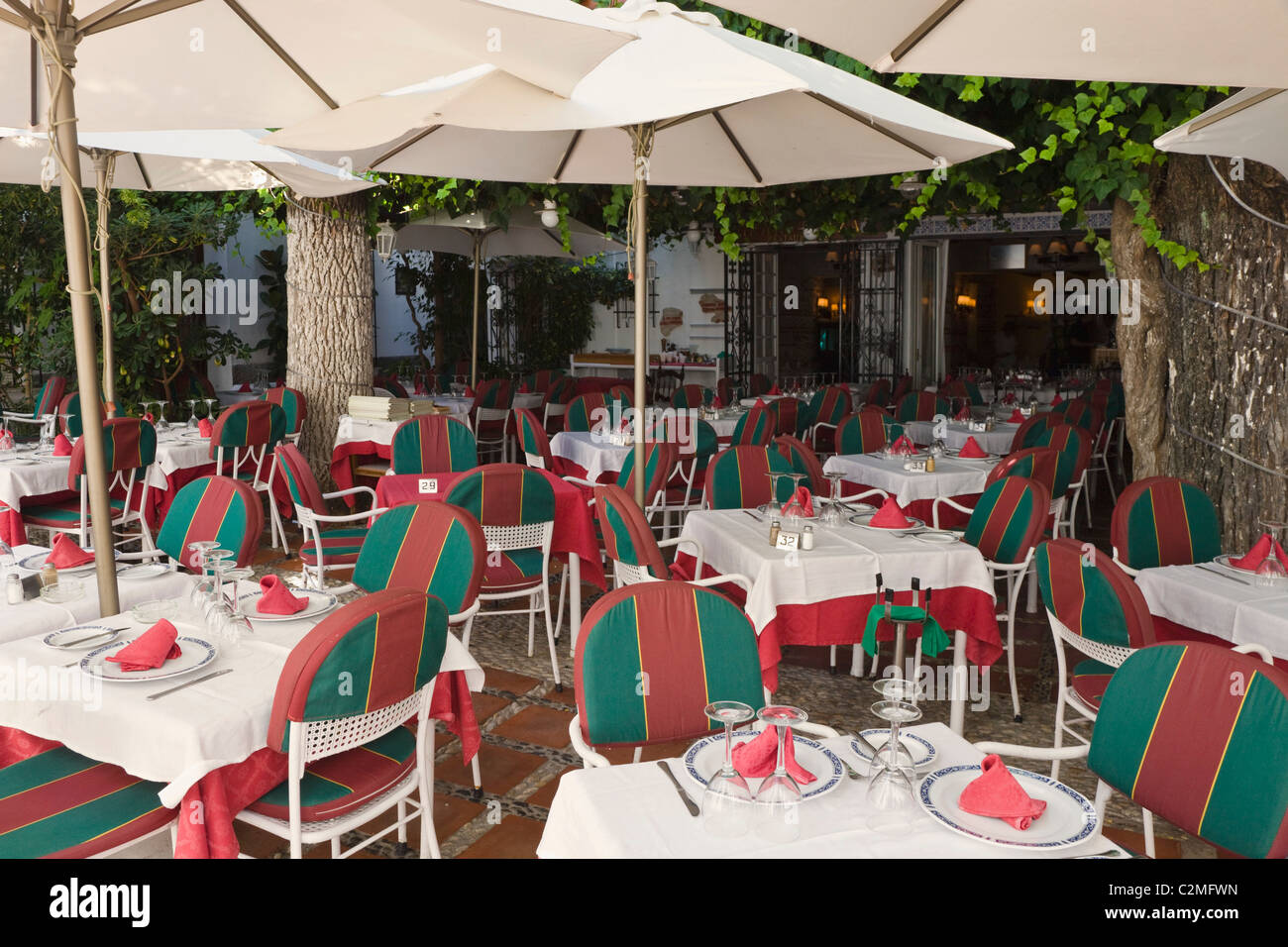 Outdoor Restaurant, Marbella, Malaga Province, Costa Del Sol, Spain Stock Photo