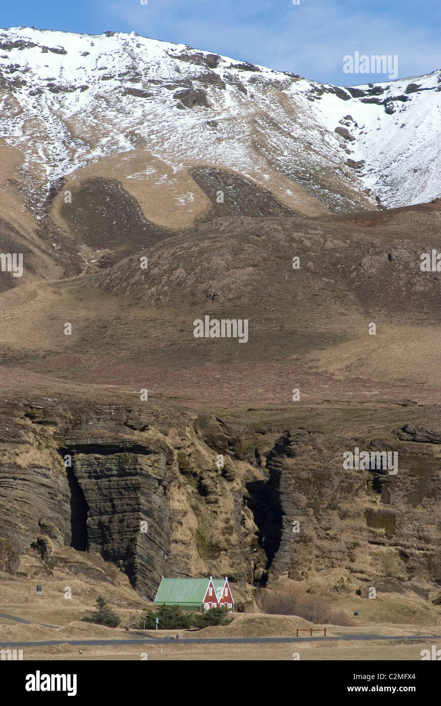 Traditional Iceland houses (with red walls and green roofs), at base of