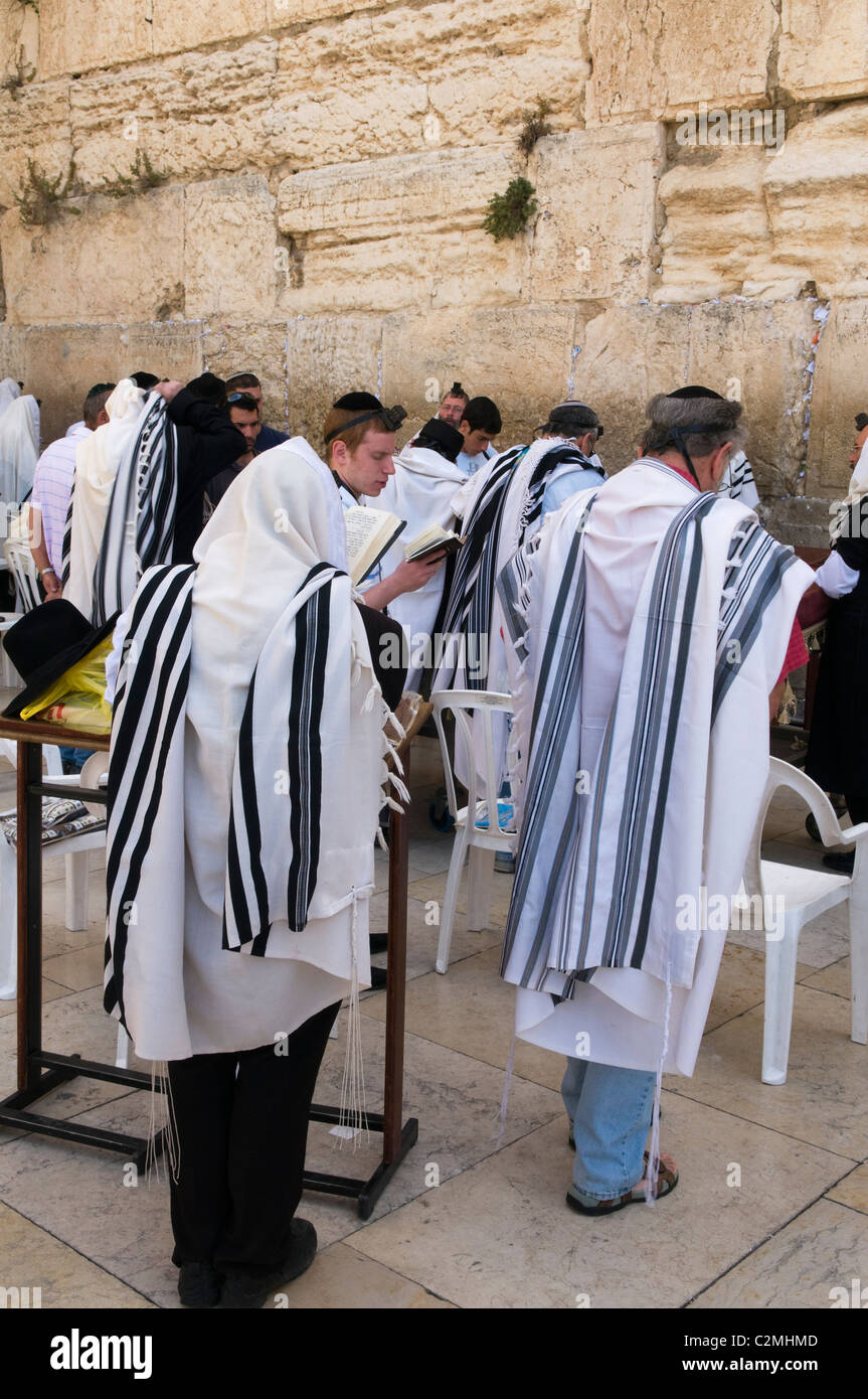Hassidic Orthodox Jews in prayer at the Western Wall in Jerusalem Stock Photo