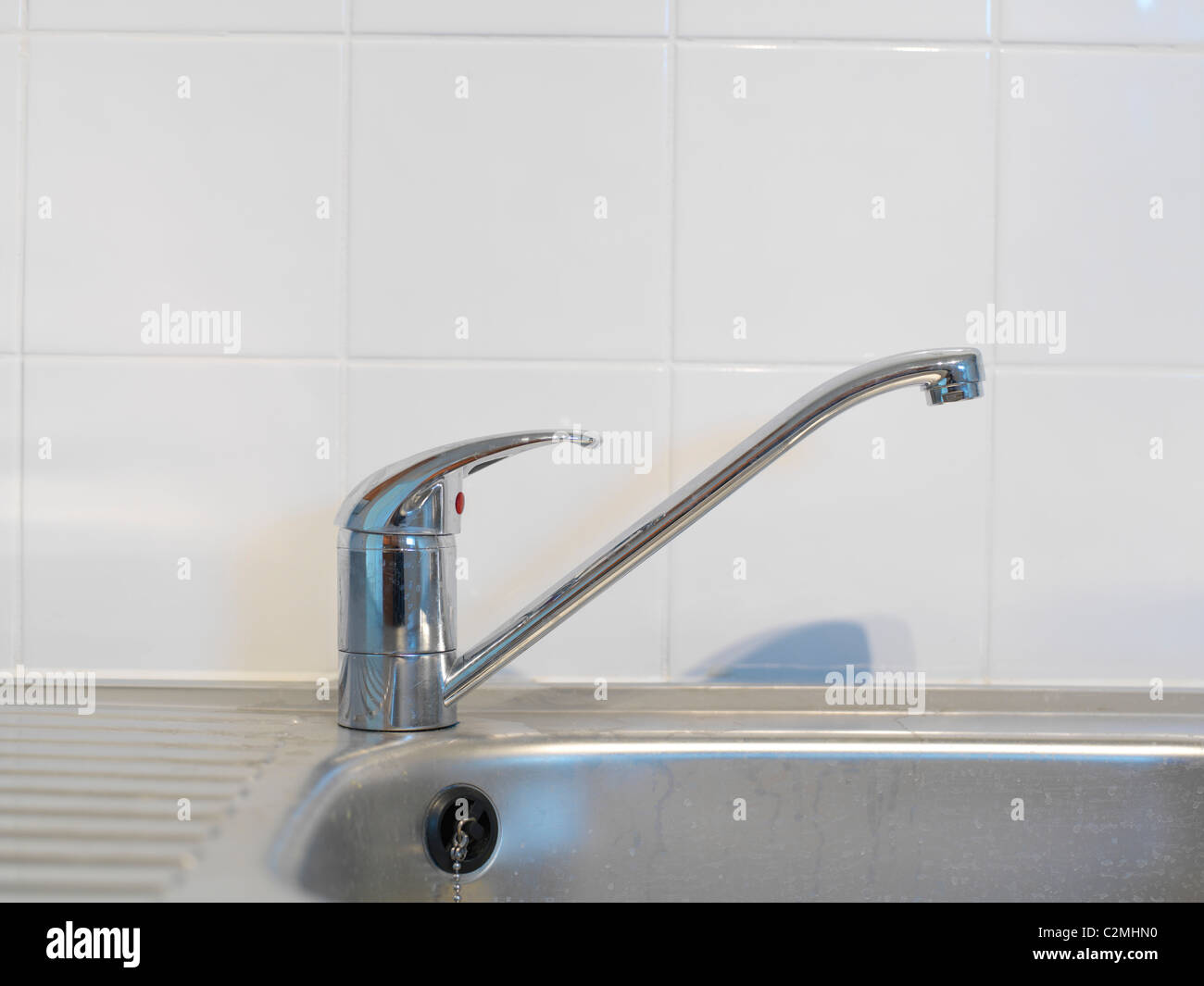 Mixer tap and sink Stock Photo Alamy