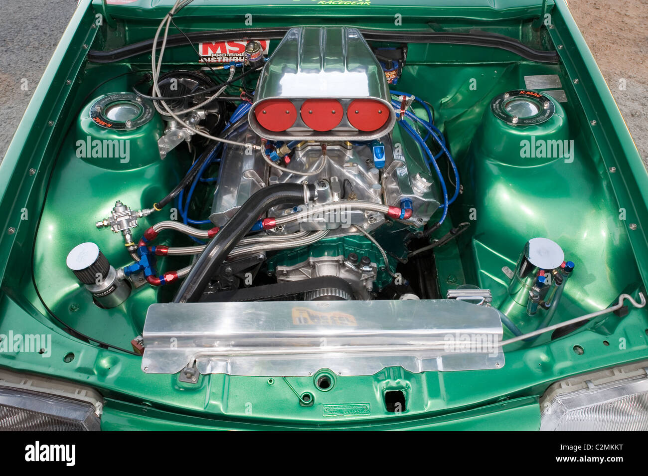 Heavily modified Holden V8 engine in an Aussie drag racing Holden Commodore. Stock Photo
