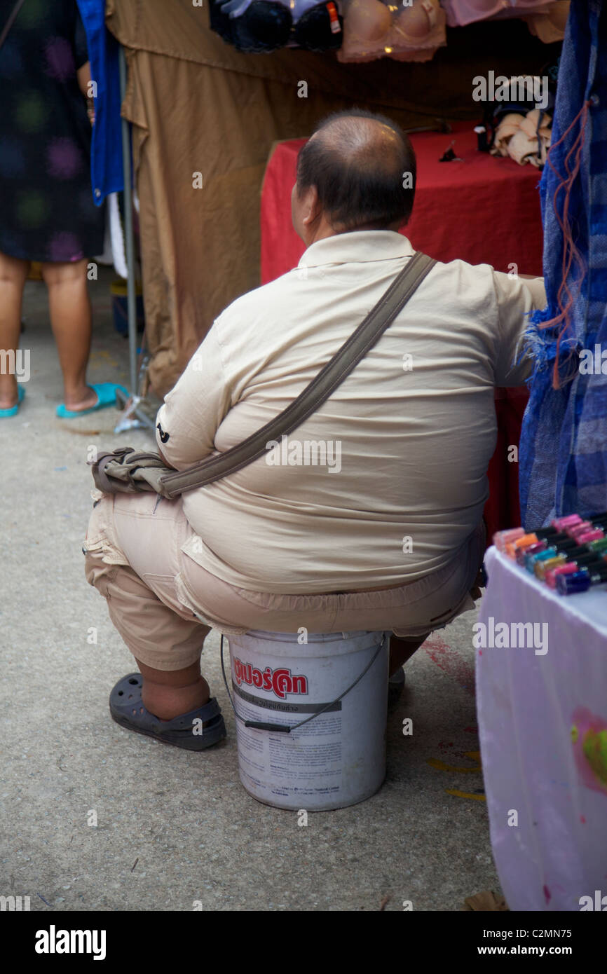 Over weight Thai man, Phuket, Thailand Stock Photo
