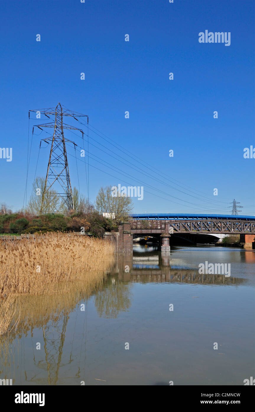 Electricity Pylons over Bow Creek (River Lea), East London, United Kingdom Stock Photo