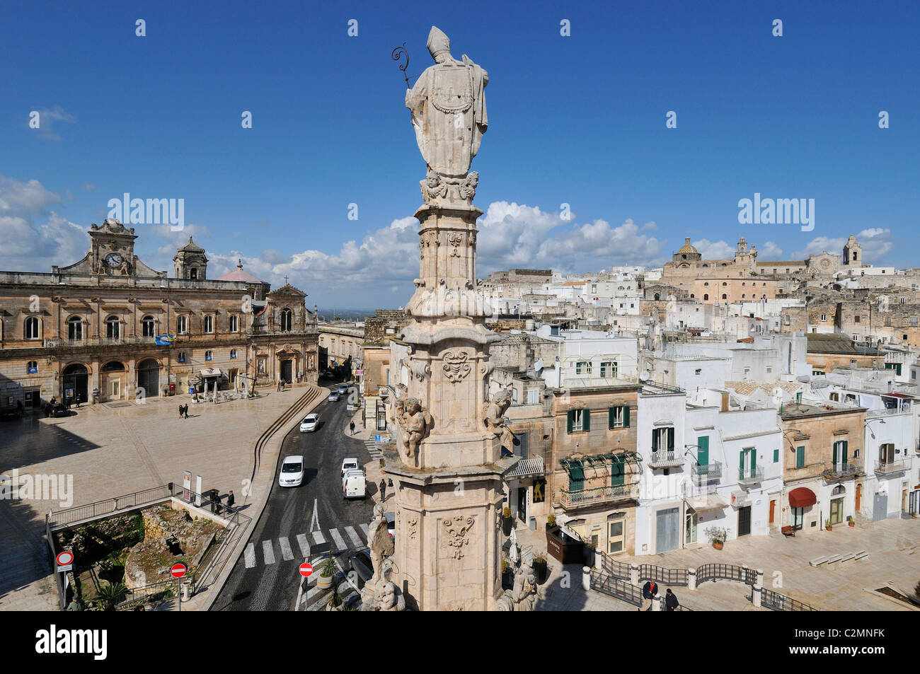 Ostuni. Puglia. Italy. View of the baroque giuglia of Sant' Oronzo overlooking Piazza della Libertà (left) & the old town. Stock Photo