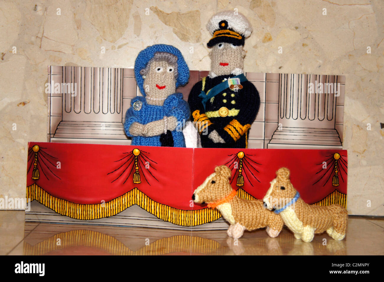 HRH Queen Elizabeth, Prince Phillip and corgi's, knitted figures. Royal wedding. Stock Photo