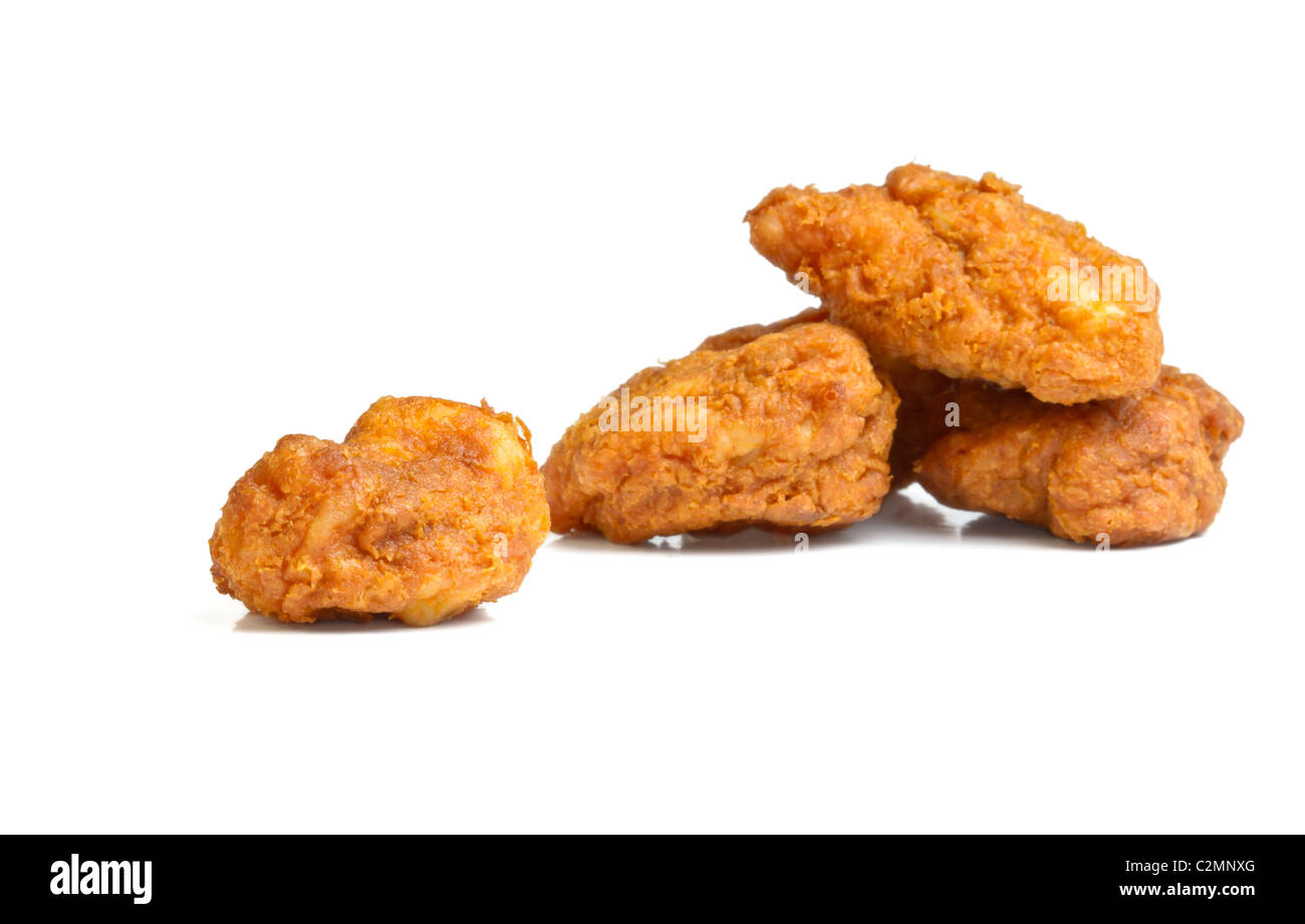 Spicy Indian pakora from low perspective isolated on white. Stock Photo
