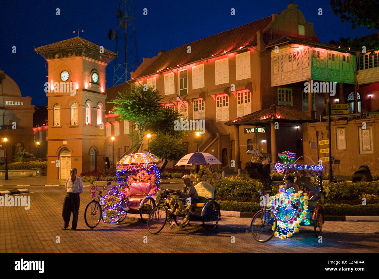 Malaysia Malacca Stadthuys square & Trishaws at night Stock Photo