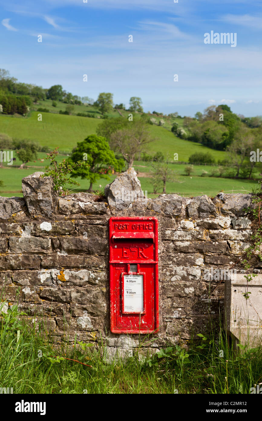Post box in the countryside - Rural Victorian postbox in The Lake District, Cumbria, England, UK Stock Photo