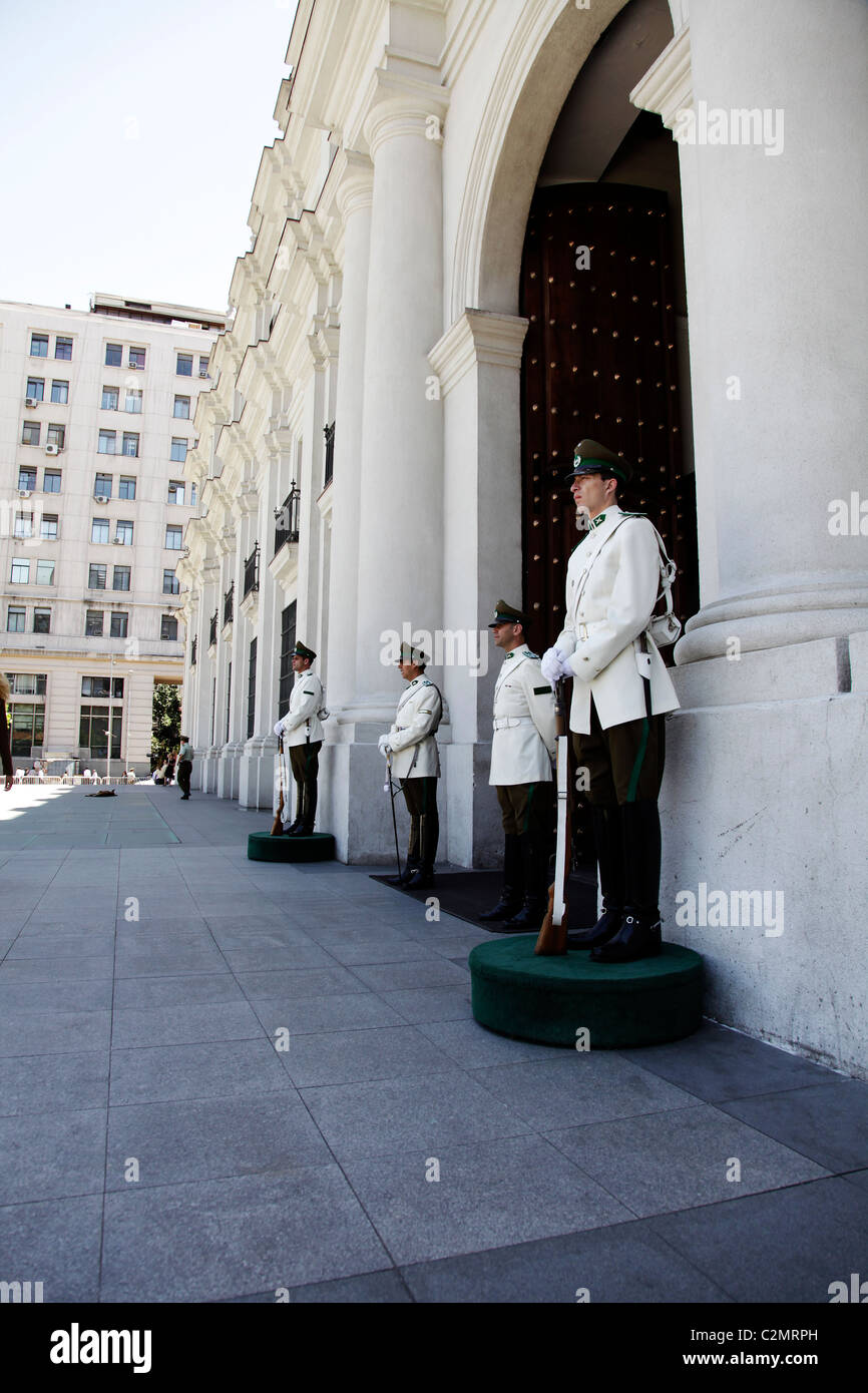 Guards outside the Palacio de Moneda (or Palace of Money) in Santiago ...