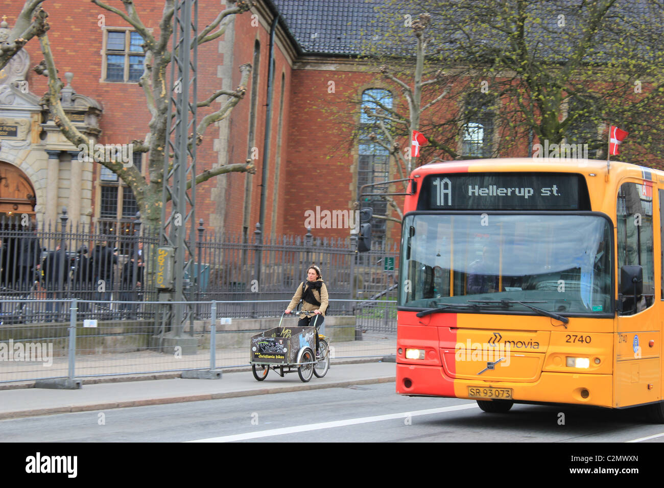 A bus decorated with Danish flags to celebrate the baptism of the royal twins in Copenhagen April 2011. Stock Photo
