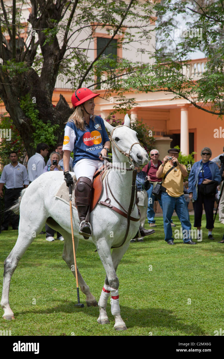 Tourists watching a polo pony and rider demonstration, La Carabassa, Argentina Stock Photo