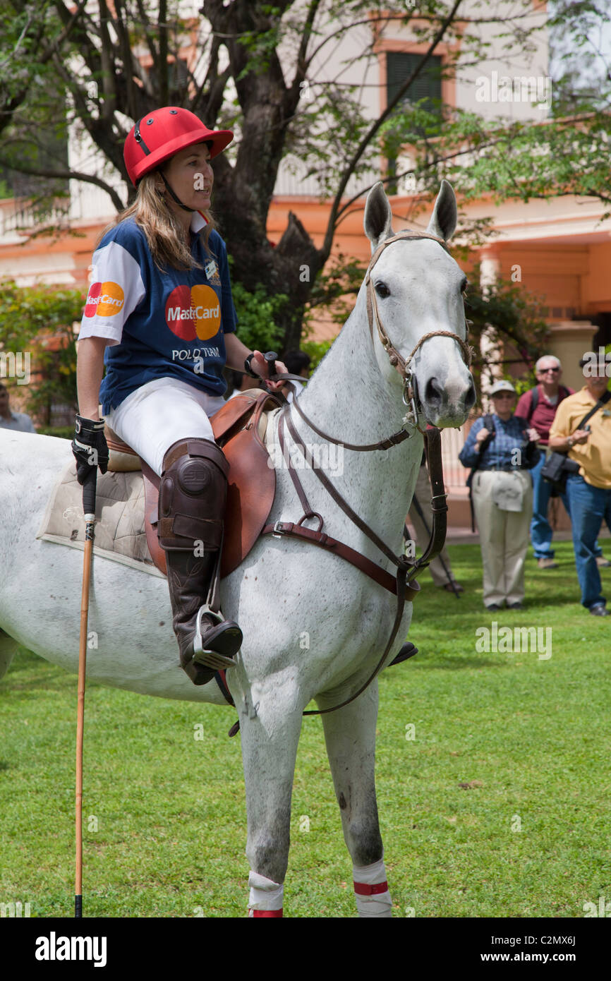 Tourists watching a polo pony and rider demonstration, La Carabassa, Argentina Stock Photo