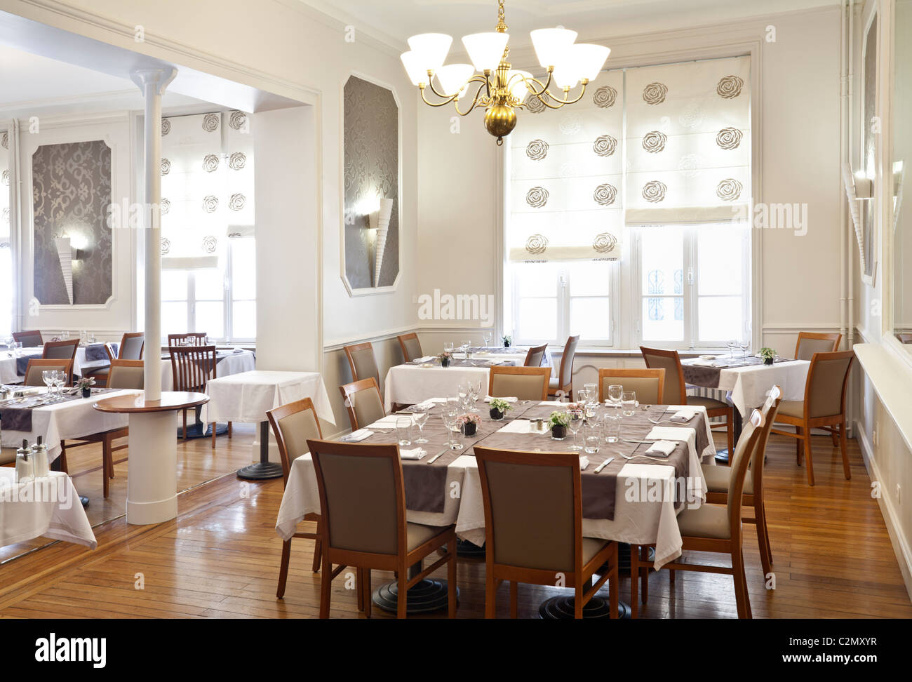 A restaurant dining room (France). Salle de restaurant (France). Stock Photo