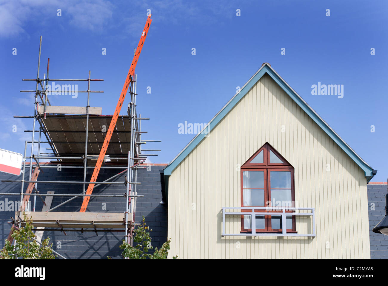Roof renovation, building site, scaffolding Stock Photo - Alamy - Apartment Building Roof Renovation