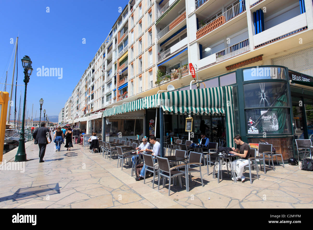 Restaurants along the military harbor of Toulon Stock Photo Alamy