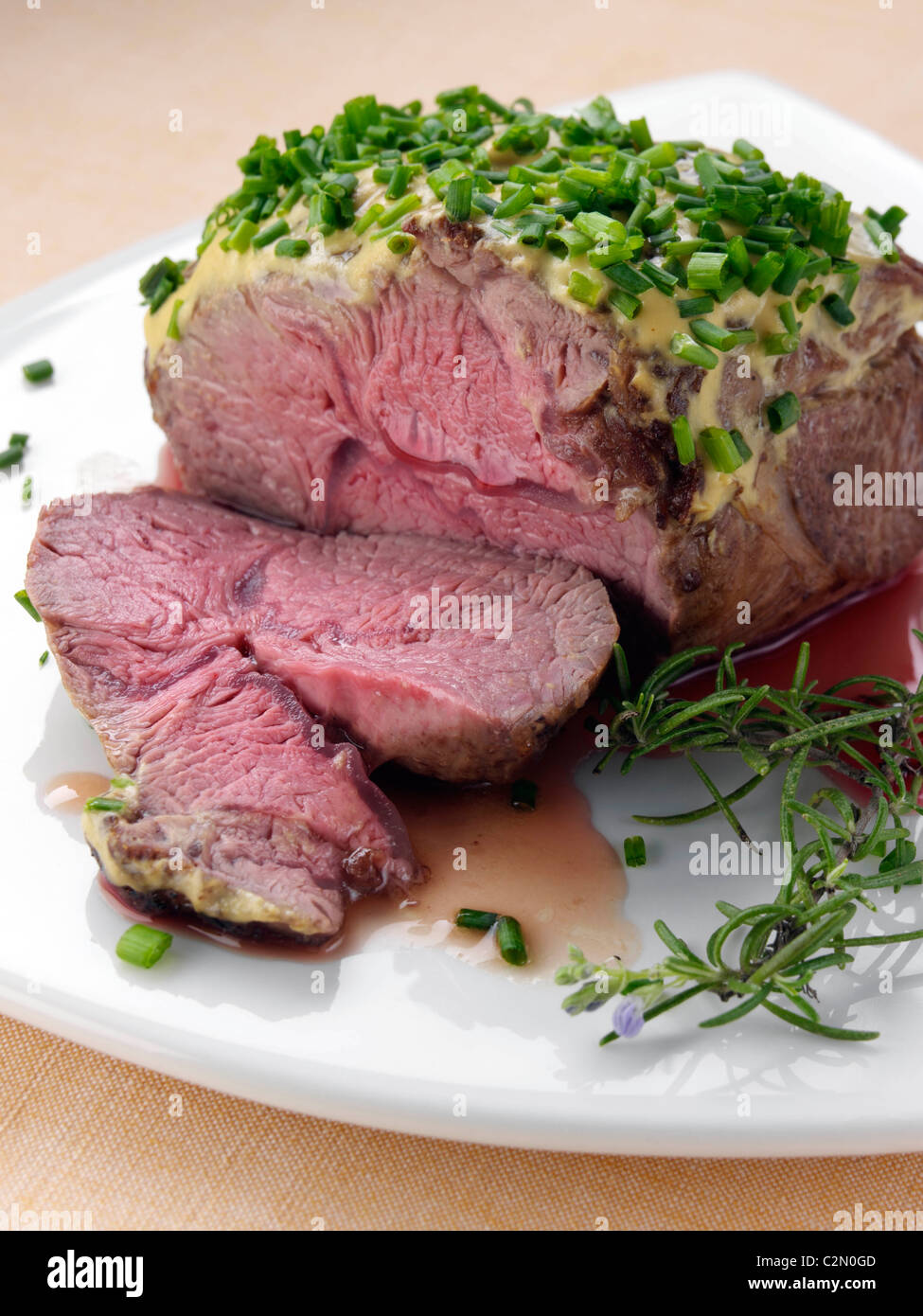 Lamb rump with a herb crust Stock Photo