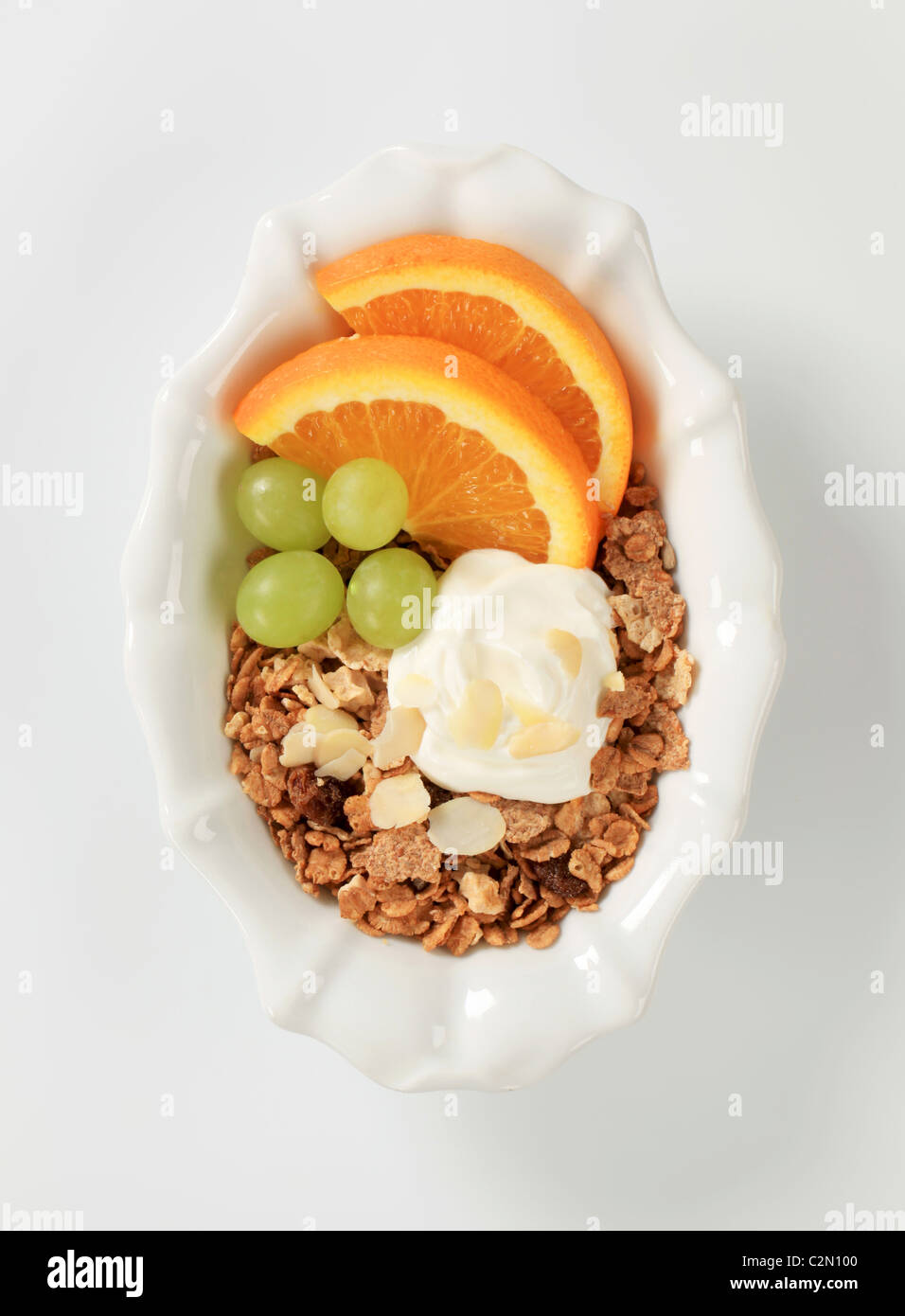 Bowl of breakfast cereals with fruit and yogurt Stock Photo Alamy