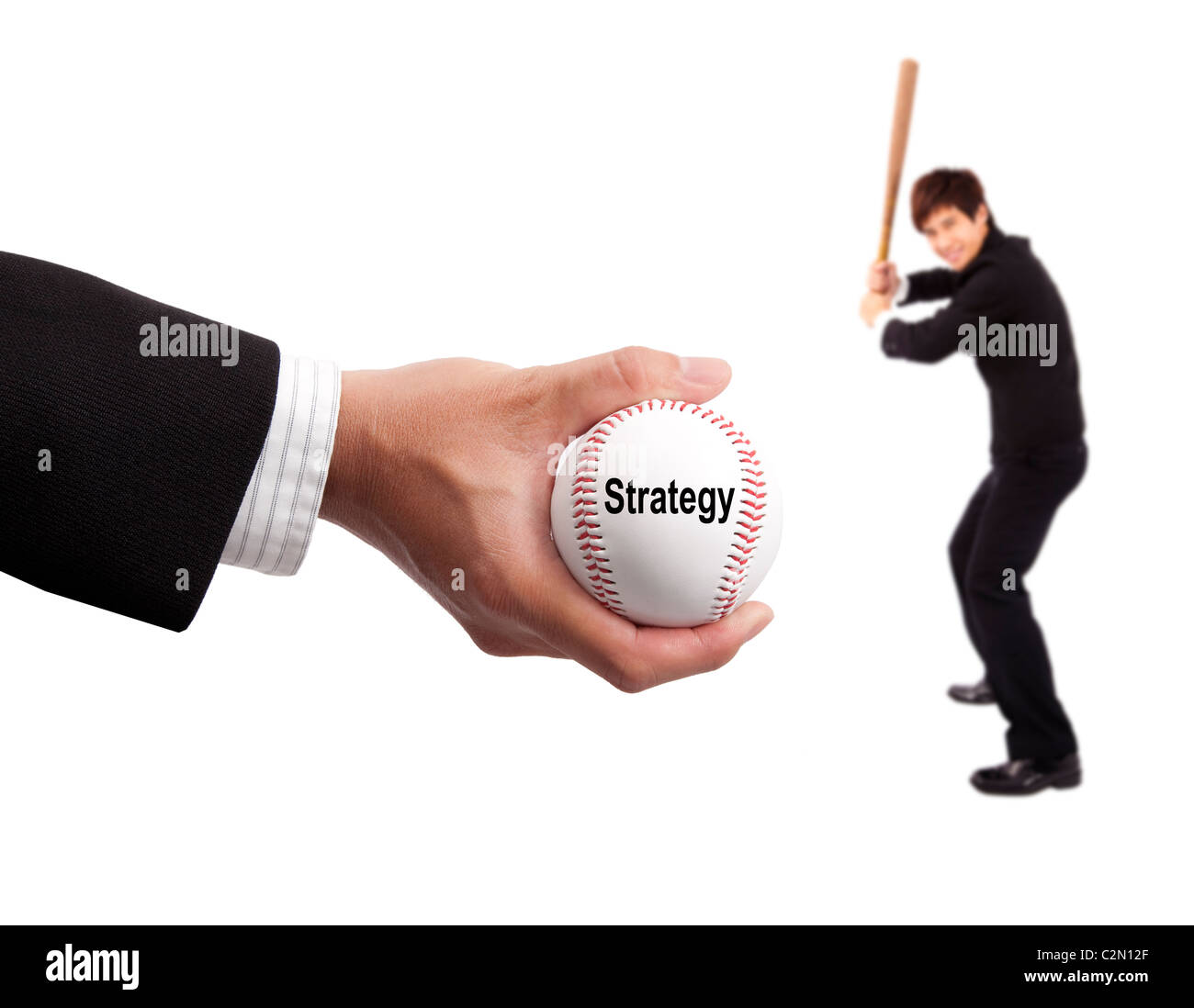 Business strategy concept. hand of businessman holding baseball and striker Stock Photo