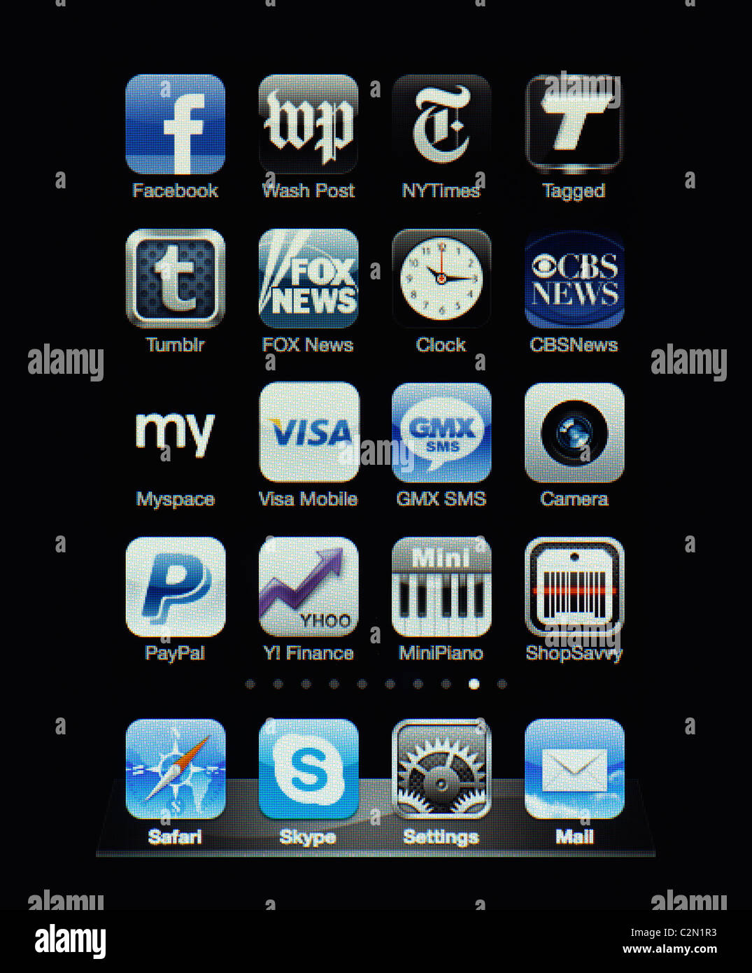 Image of the iphone touch screen. Display shows a collection of useful apps with blue and grey color scheme. Stock Photo
