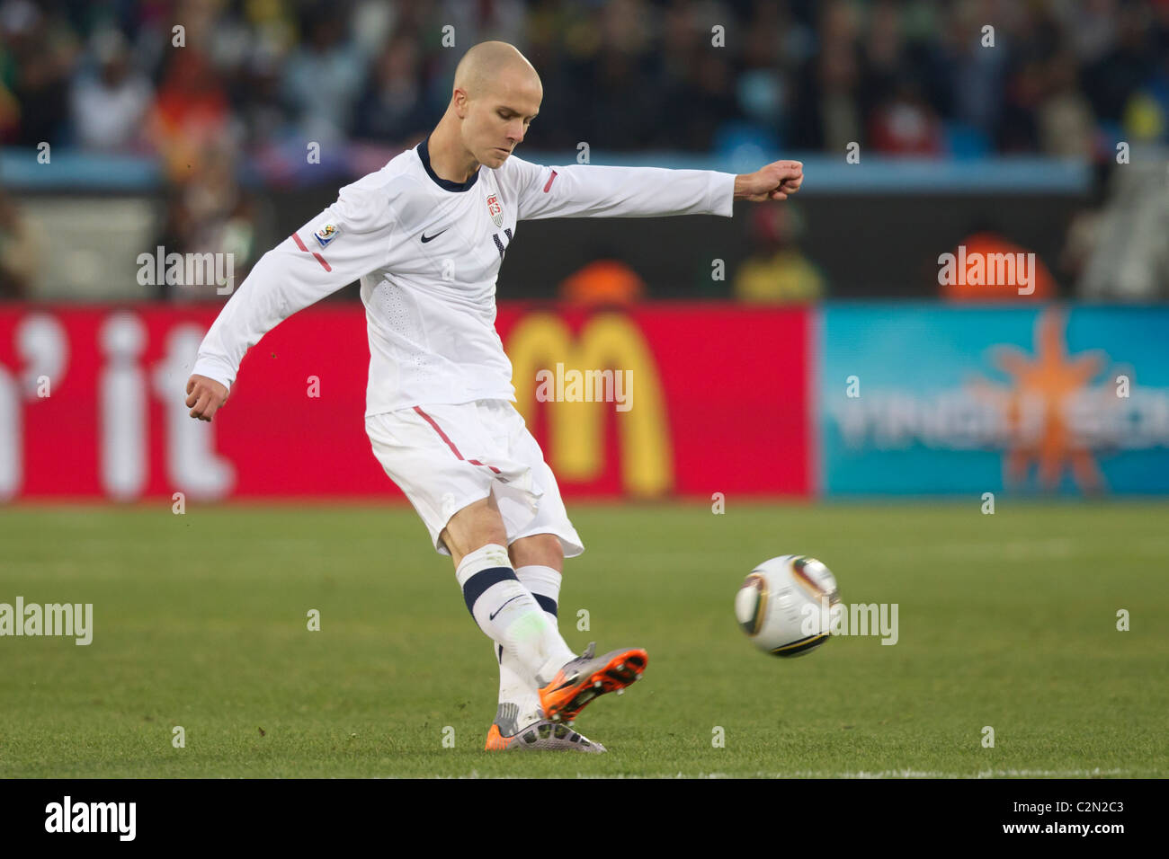 Michael Bradley of the USA kicks the ball during a 2010 FIFA World Cup Group C match against Algeria June 23, 2010. Stock Photo