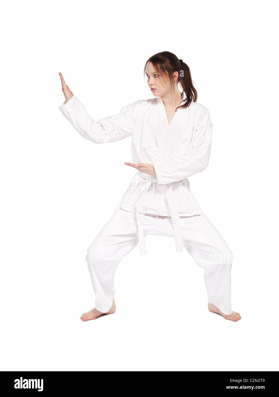 fulllength isolated portrait of beautiful martial arts girl in kimono