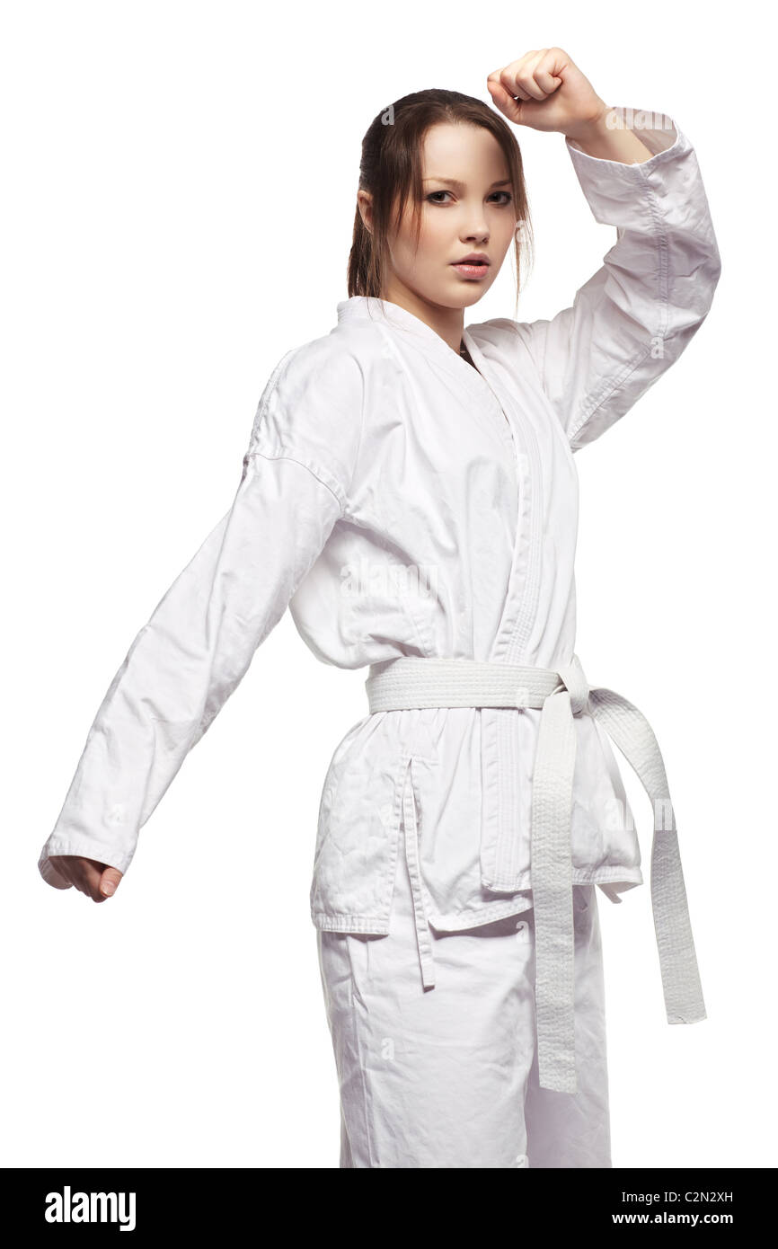 isolated portrait of beautiful martial arts girl in kimono excercising  karate kata Stock Photo - Alamy