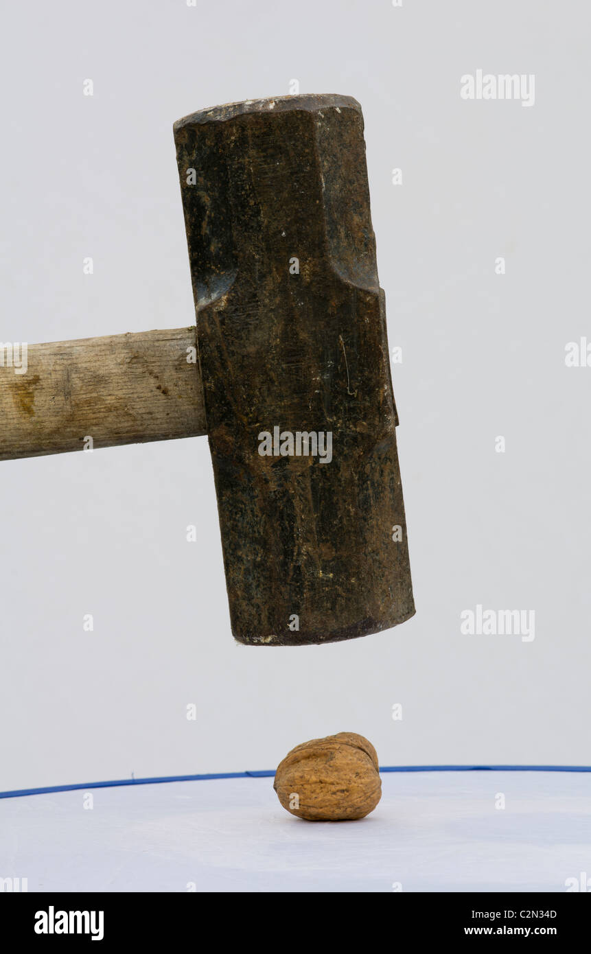 A sledgehammer to crack a nut Stock Photo Alamy