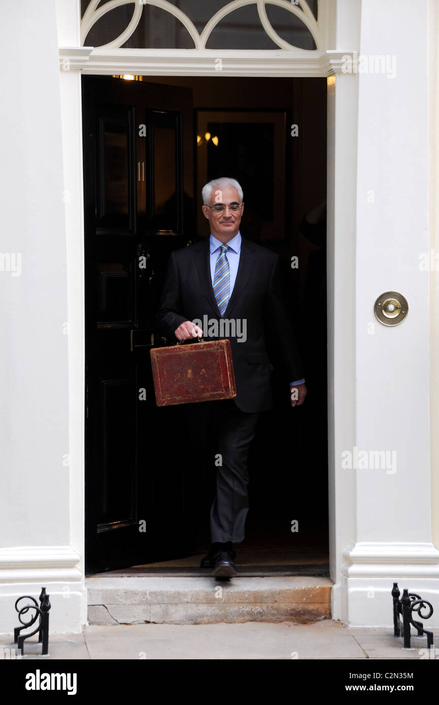 Former Chancellor of the Exchequer, the Right Hon Alistair Darling MP, leaves Number 11 Downing street with the 2009 Budget. Stock Photo
