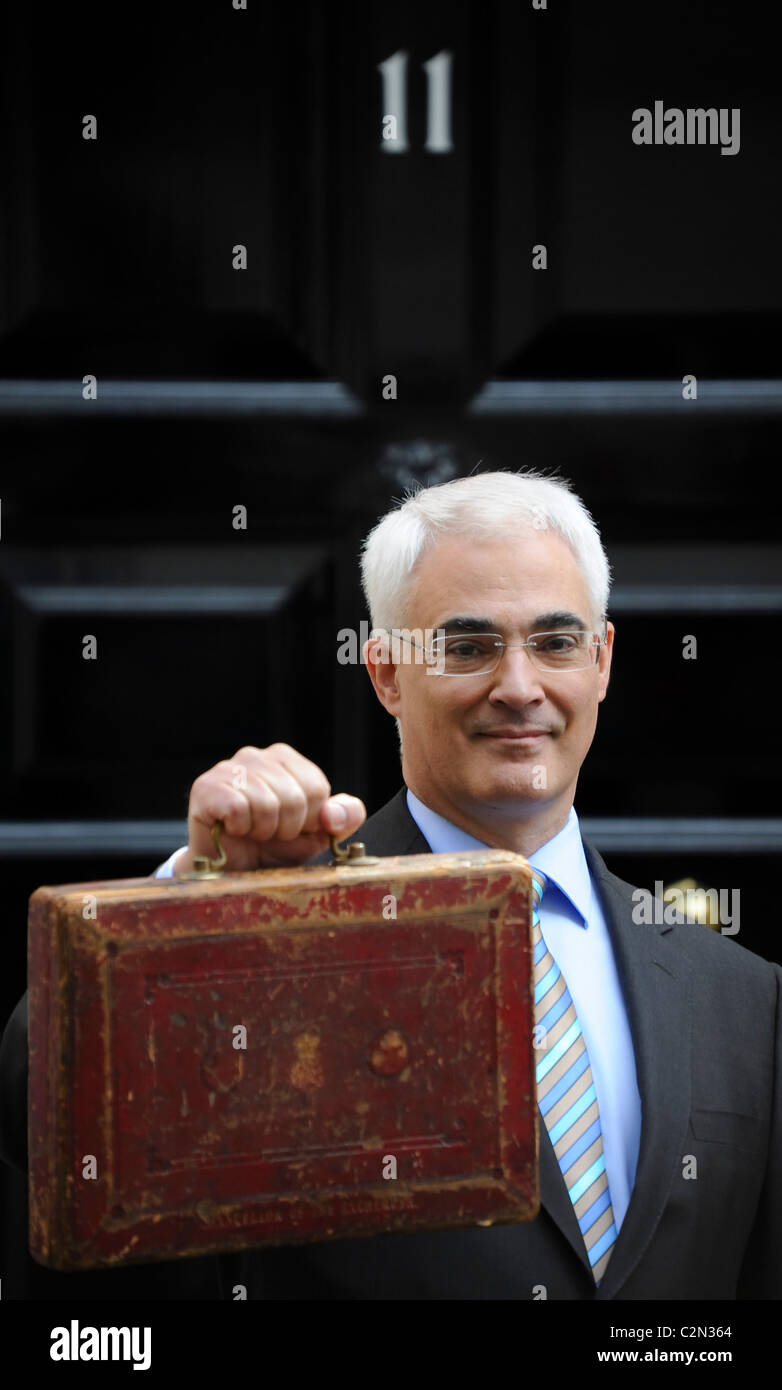 Former Chancellor of the Exchequer, the Right Hon Alistair Darling MP, leaves Number 11 Downing street with the 2009 Budget. Stock Photo