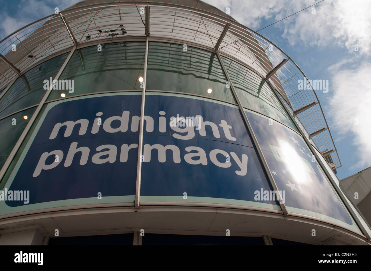 BRIGHTON, ENGLAND, 26th September 2010 - Midnight Pharmacy sign on a Boots store. EDITORIAL USE ONLY. Stock Photo