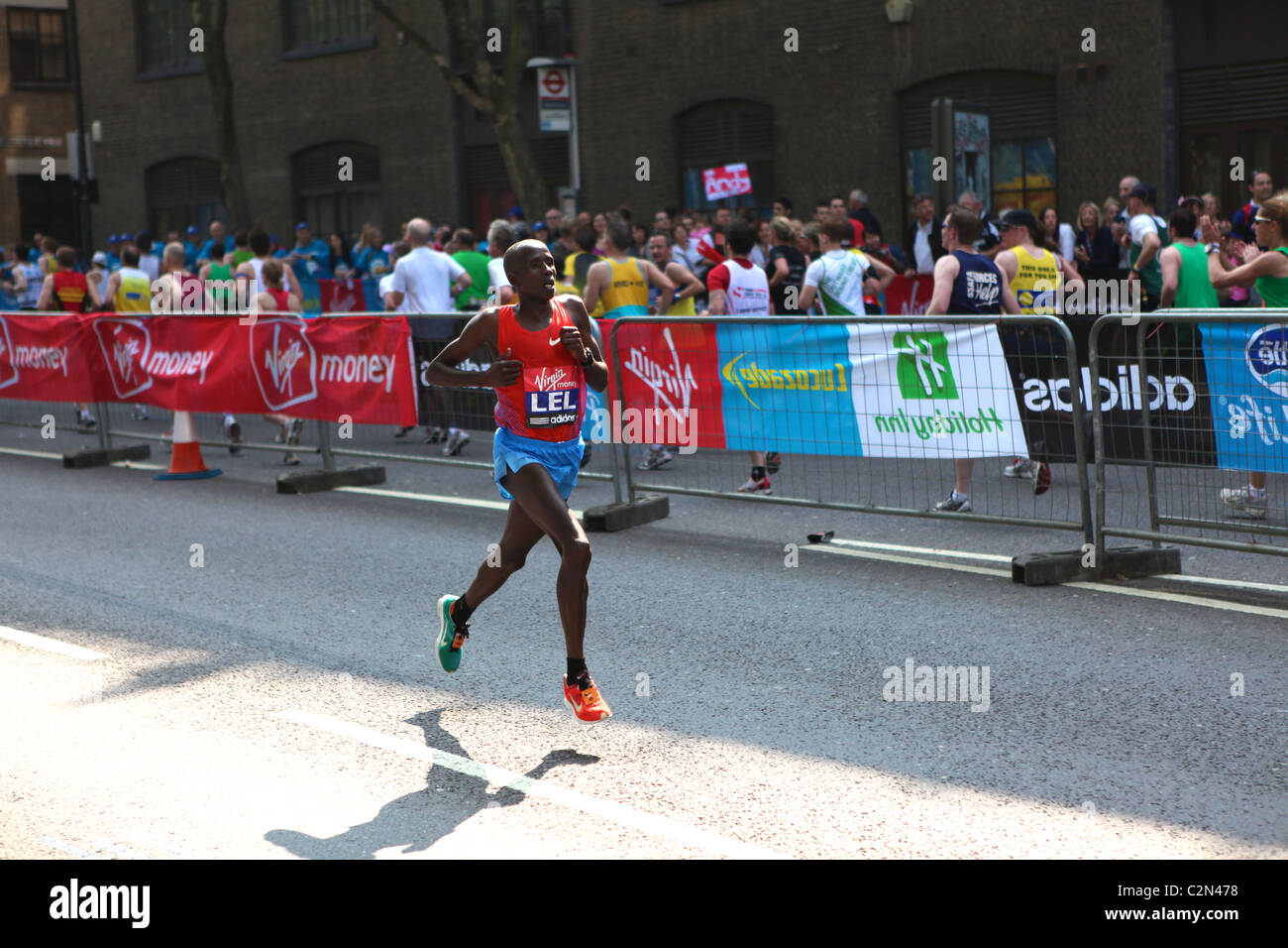 Thousands have joined the world's top long distance runners for a