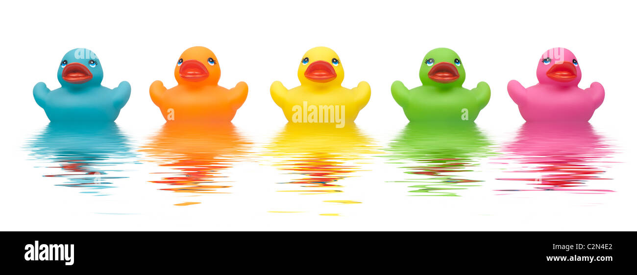 Colourful Rubber Ducks with water ripples Stock Photo