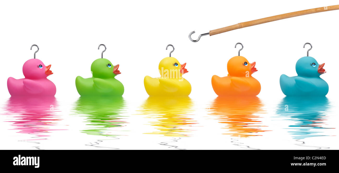 Colourful Rubber Ducks with water ripples and hook about to win one Stock Photo