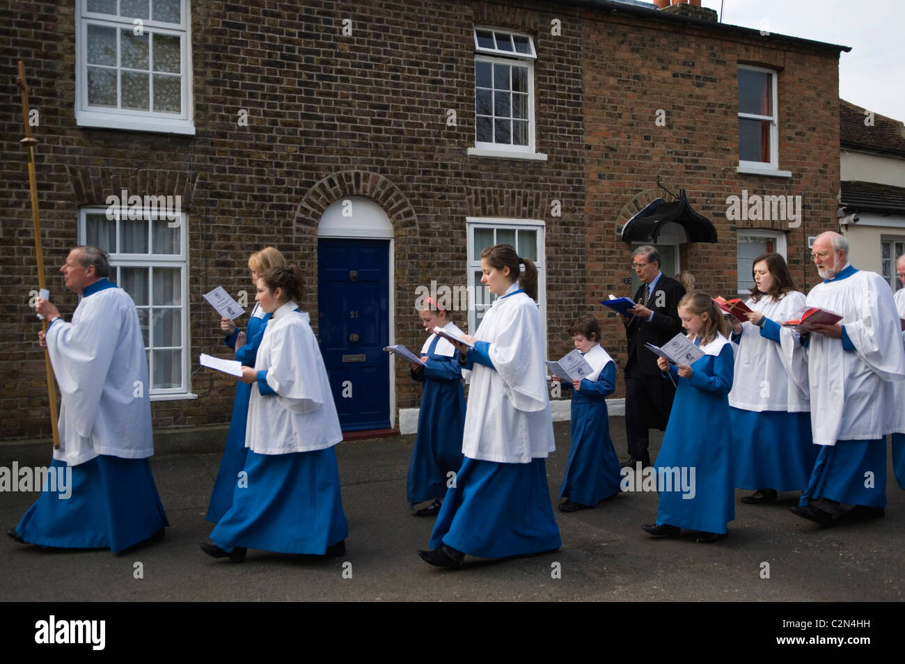 Palm Sunday. St Mary the Virgin Church of England, Merton, South Wimbledon London UK. Choir process back to church. HOMER SYKES Stock Photo